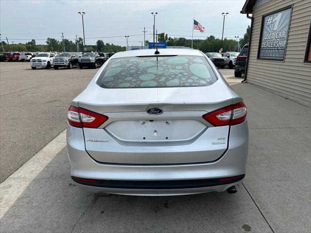 used 2016 Ford Fusion car, priced at $6,995