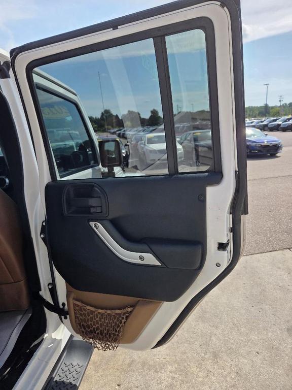 used 2013 Jeep Wrangler Unlimited car, priced at $10,995