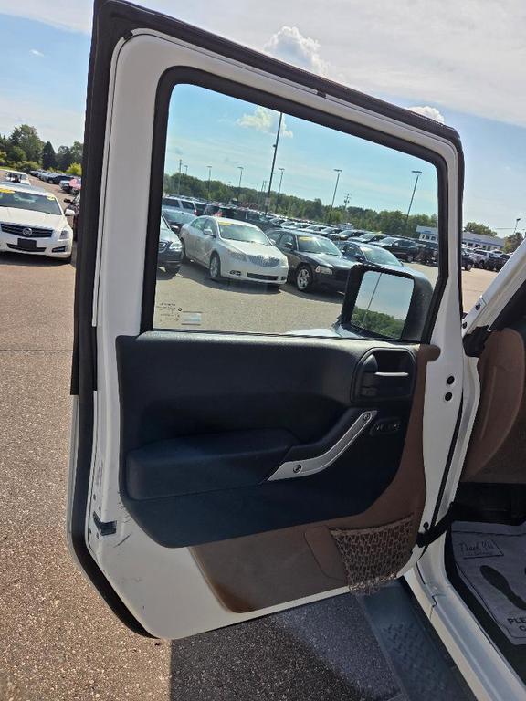 used 2013 Jeep Wrangler Unlimited car, priced at $10,995