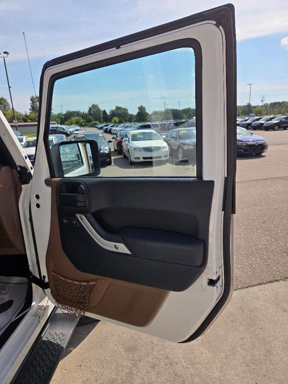 used 2013 Jeep Wrangler Unlimited car, priced at $10,995