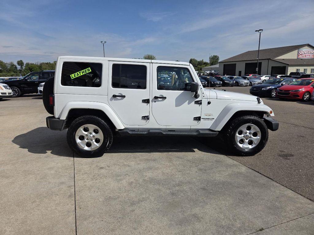 used 2013 Jeep Wrangler Unlimited car, priced at $10,995