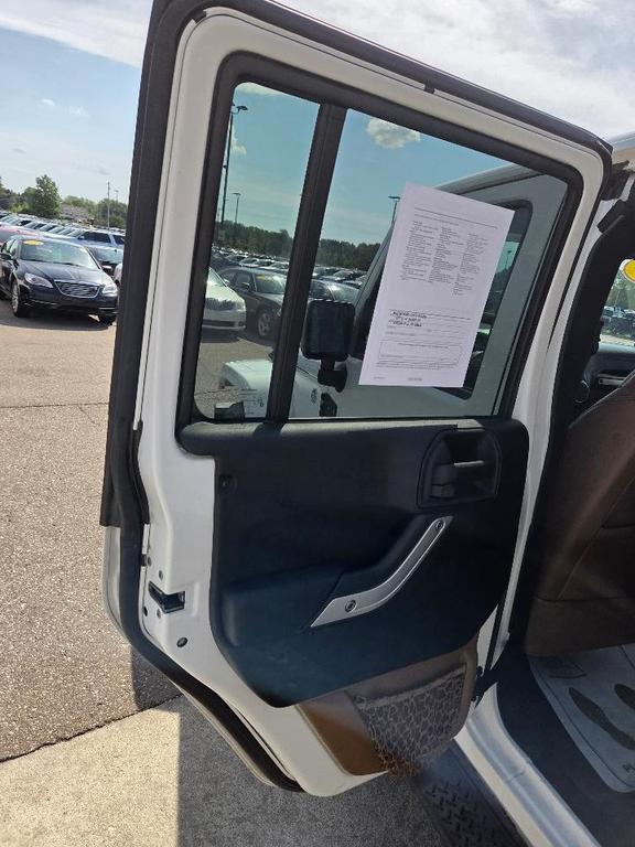 used 2013 Jeep Wrangler Unlimited car, priced at $10,995