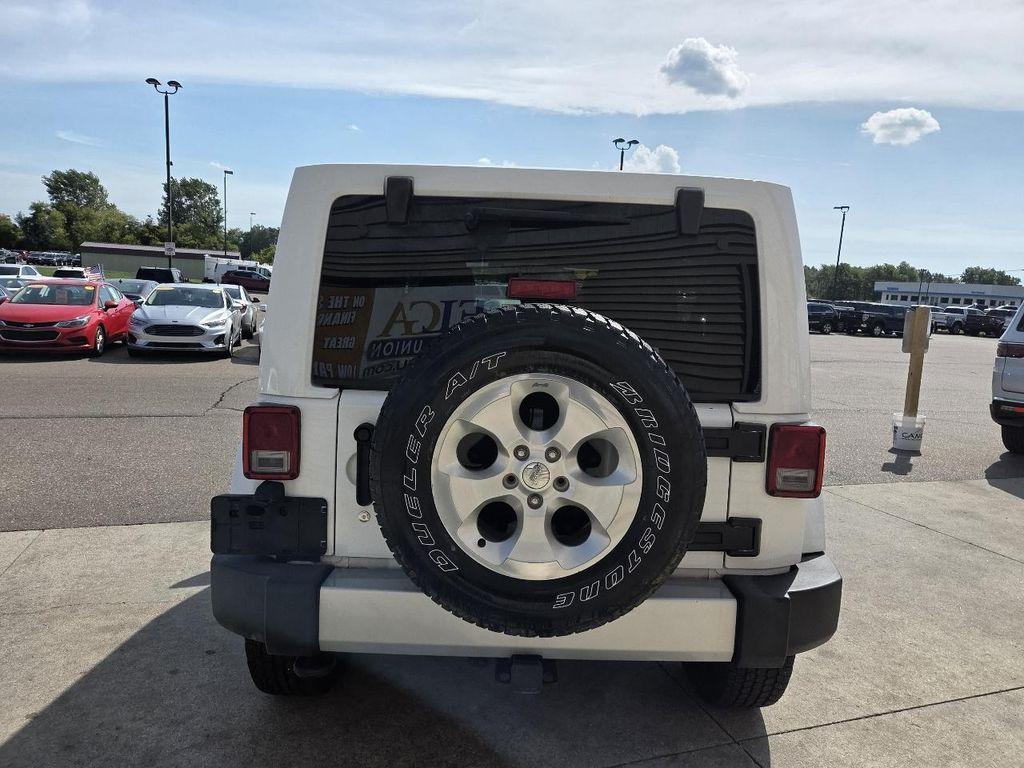 used 2013 Jeep Wrangler Unlimited car, priced at $10,995