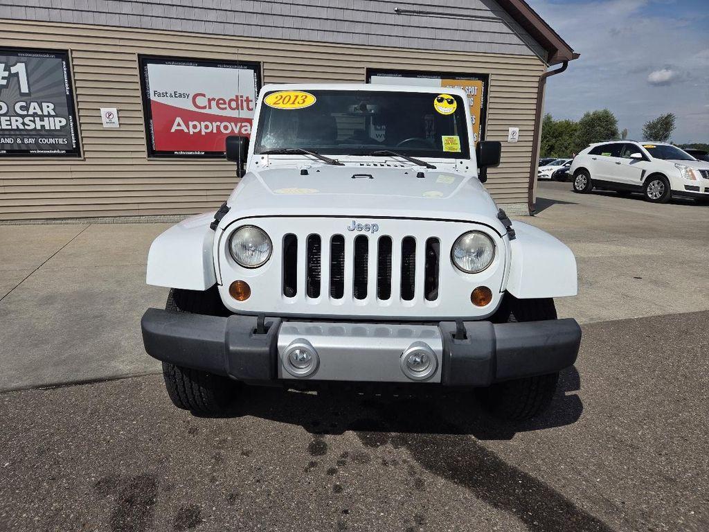 used 2013 Jeep Wrangler Unlimited car, priced at $10,995