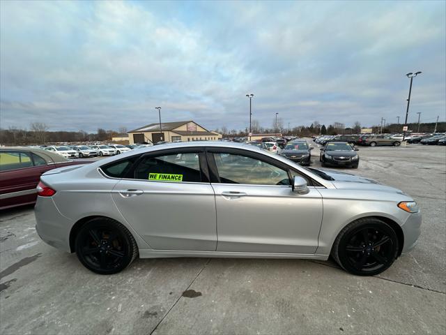 used 2016 Ford Fusion car, priced at $6,995