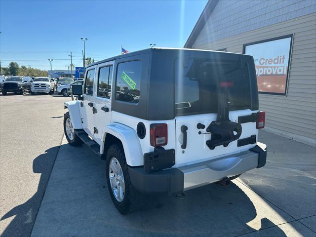 used 2010 Jeep Wrangler Unlimited car, priced at $10,995