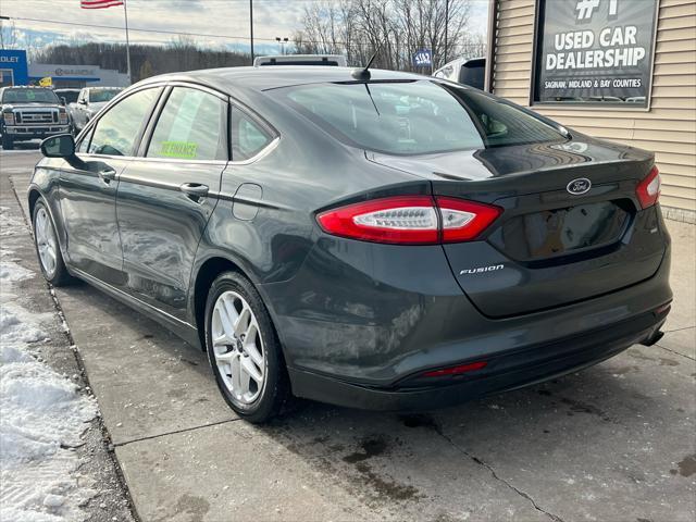 used 2015 Ford Fusion car, priced at $5,495