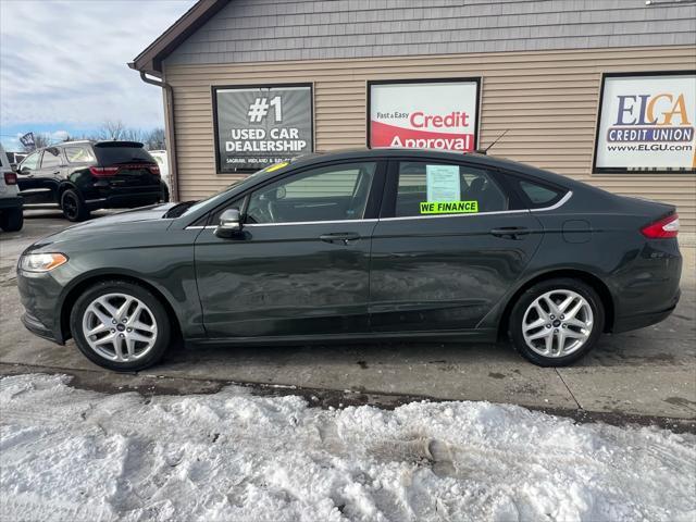 used 2015 Ford Fusion car, priced at $5,495