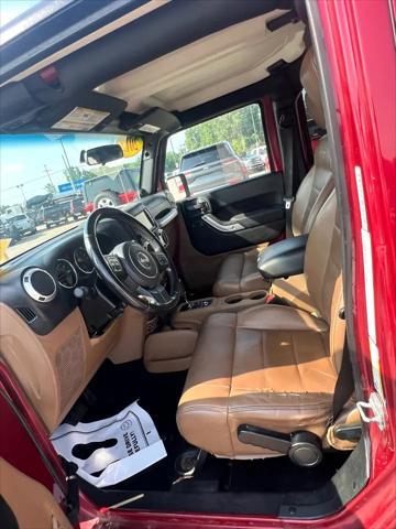 used 2012 Jeep Wrangler Unlimited car, priced at $8,995