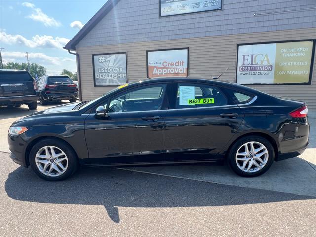 used 2014 Ford Fusion car, priced at $5,995