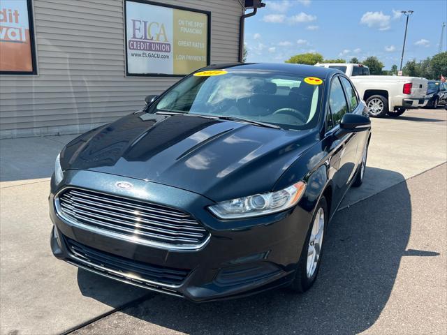 used 2014 Ford Fusion car, priced at $5,995