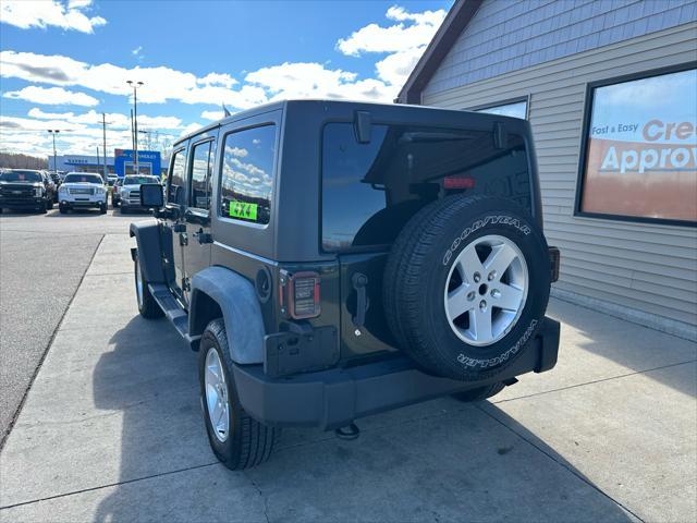 used 2011 Jeep Wrangler Unlimited car, priced at $10,995