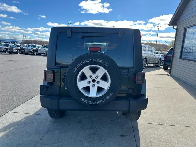 used 2011 Jeep Wrangler Unlimited car, priced at $10,995