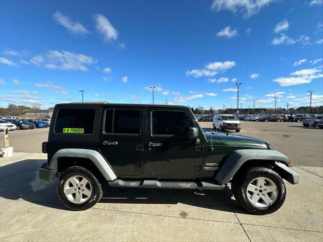 used 2011 Jeep Wrangler Unlimited car, priced at $10,995