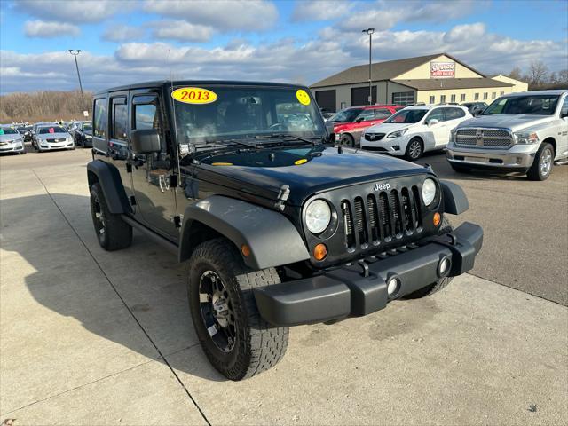 used 2013 Jeep Wrangler Unlimited car, priced at $12,995