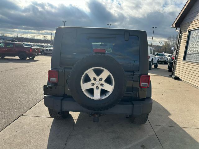 used 2013 Jeep Wrangler Unlimited car, priced at $12,995