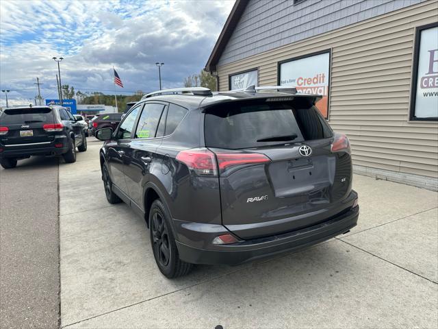 used 2018 Toyota RAV4 car, priced at $12,995