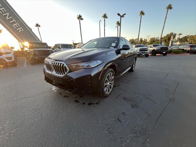 used 2024 BMW X6 car, priced at $73,143