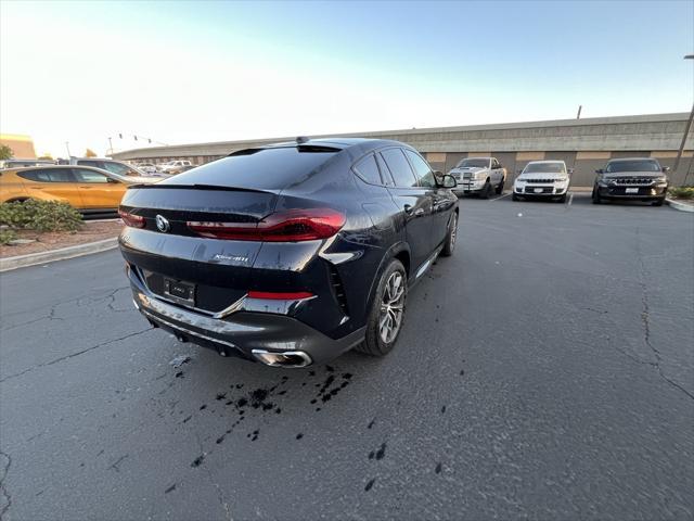 used 2024 BMW X6 car, priced at $73,143