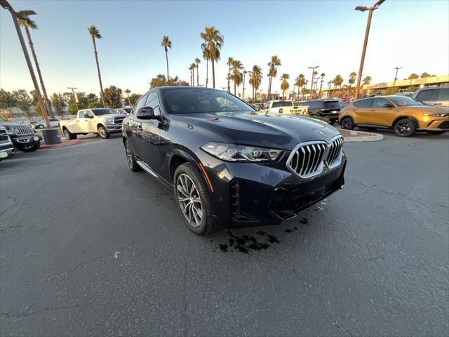 used 2024 BMW X6 car, priced at $73,143