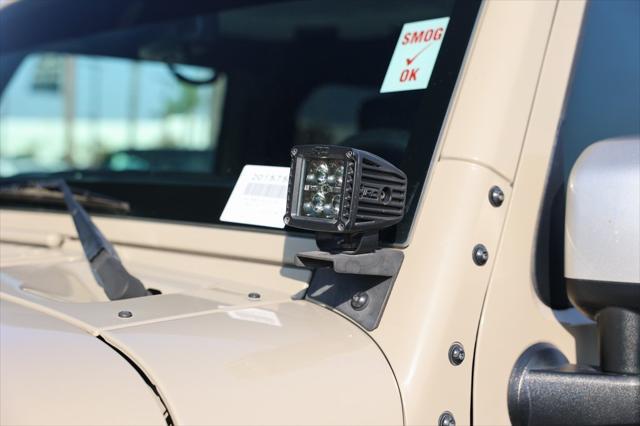 used 2017 Jeep Wrangler Unlimited car, priced at $26,143