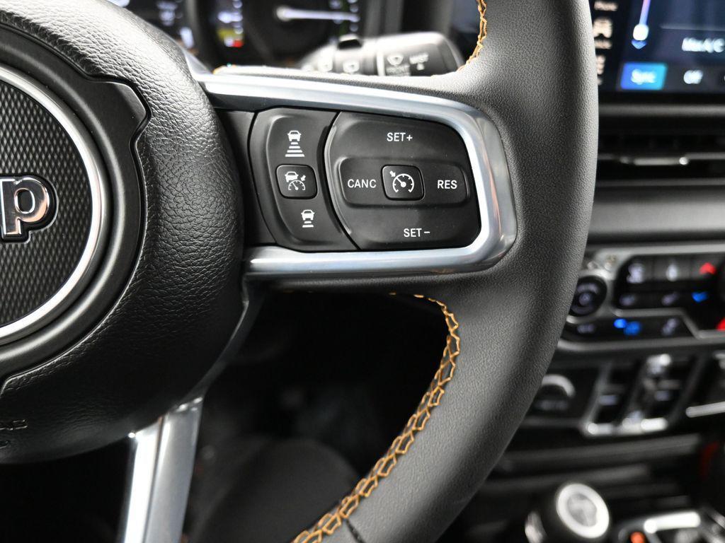 used 2024 Jeep Wrangler 4xe car, priced at $37,854