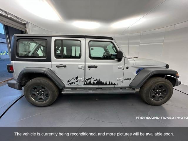 used 2023 Jeep Wrangler car, priced at $28,379