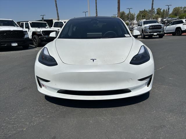 used 2023 Tesla Model 3 car, priced at $32,560