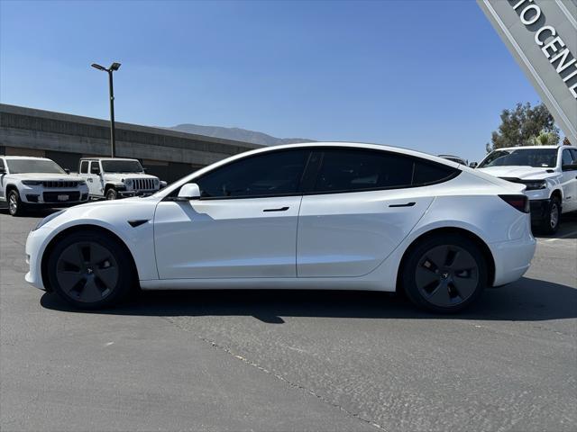 used 2023 Tesla Model 3 car, priced at $32,560