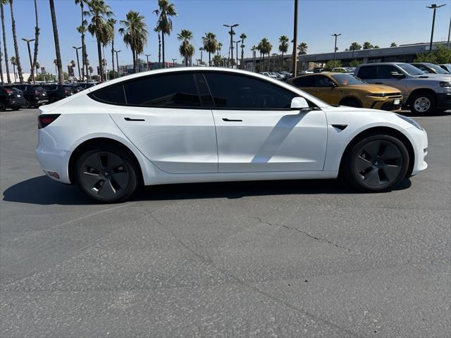 used 2023 Tesla Model 3 car, priced at $32,560