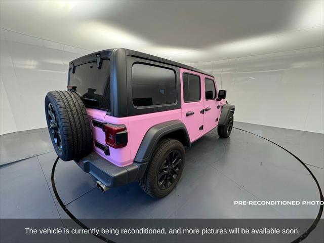 used 2021 Jeep Wrangler Unlimited car, priced at $29,944