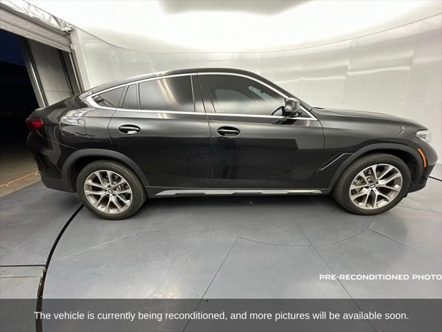 used 2023 BMW X6 car, priced at $54,988