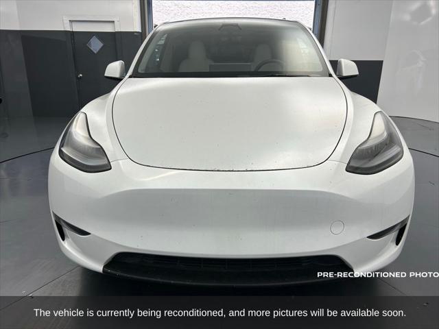 used 2023 Tesla Model Y car, priced at $33,716