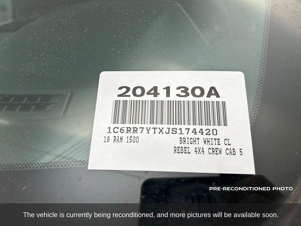 used 2018 Ram 1500 car, priced at $28,385