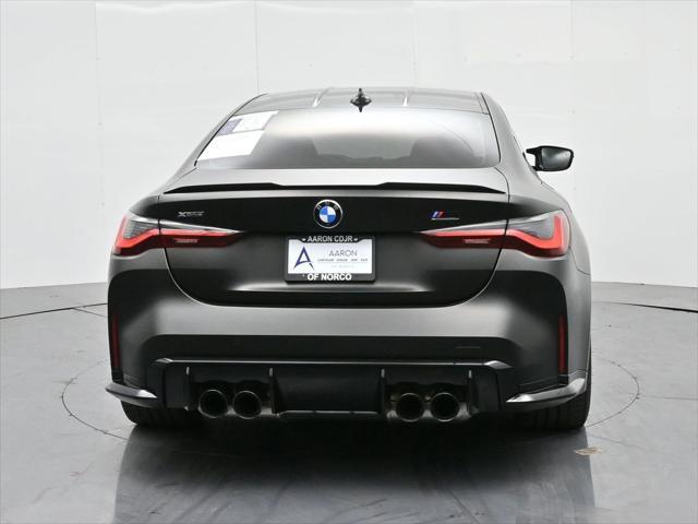 used 2023 BMW M4 car, priced at $76,457