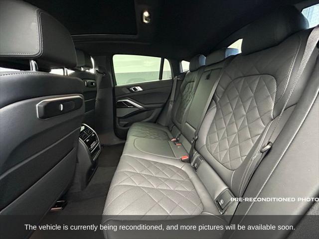 used 2024 BMW X6 car, priced at $65,802