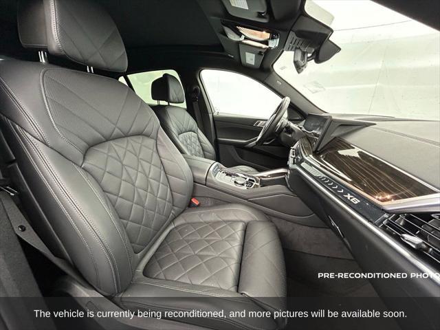used 2024 BMW X6 car, priced at $65,802