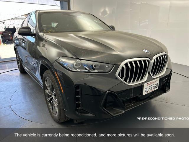 used 2024 BMW X6 car, priced at $65,802
