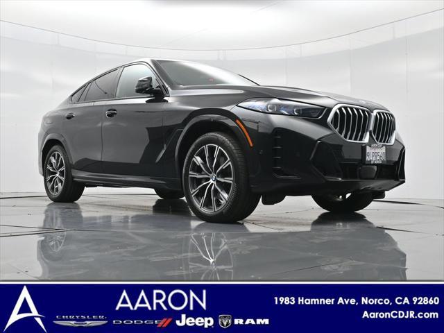 used 2024 BMW X6 car, priced at $58,692