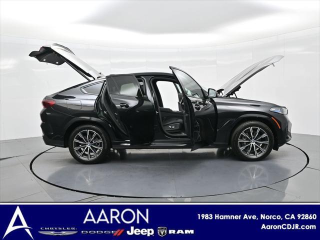 used 2024 BMW X6 car, priced at $58,692