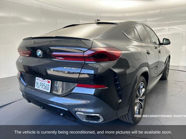 used 2024 BMW X6 car, priced at $65,802