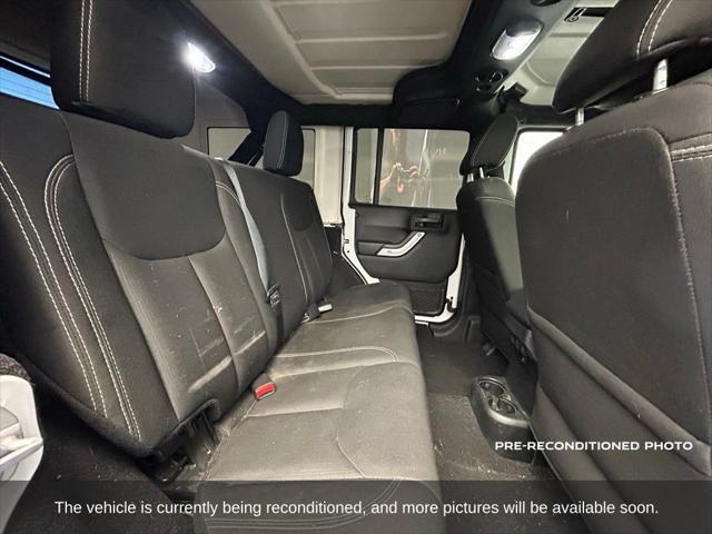 used 2018 Jeep Wrangler JK Unlimited car, priced at $24,998