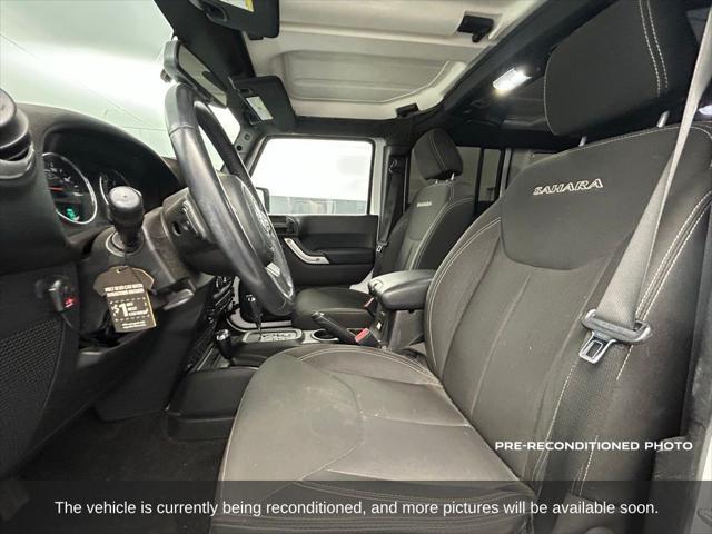 used 2018 Jeep Wrangler JK Unlimited car, priced at $24,998