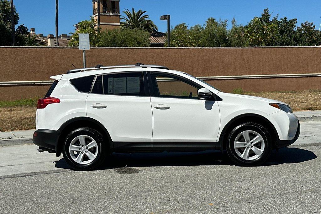 used 2013 Toyota RAV4 car, priced at $13,001