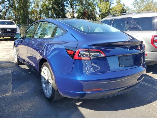 used 2023 Tesla Model 3 car, priced at $28,995