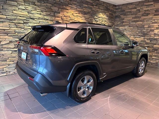 used 2023 Toyota RAV4 Hybrid car, priced at $32,000