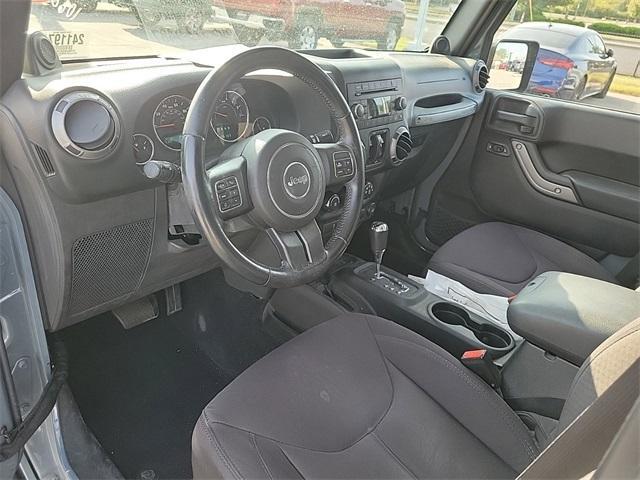 used 2014 Jeep Wrangler Unlimited car, priced at $21,990