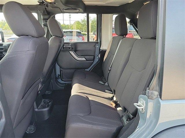 used 2014 Jeep Wrangler Unlimited car, priced at $20,990