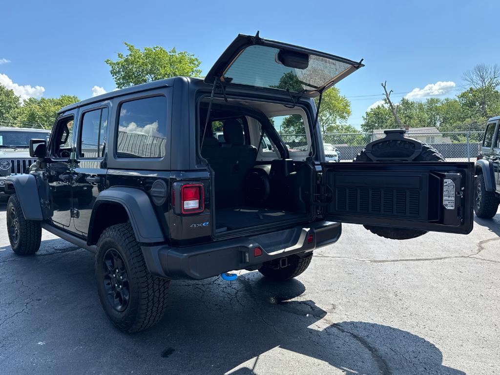 used 2023 Jeep Wrangler 4xe car, priced at $27,388