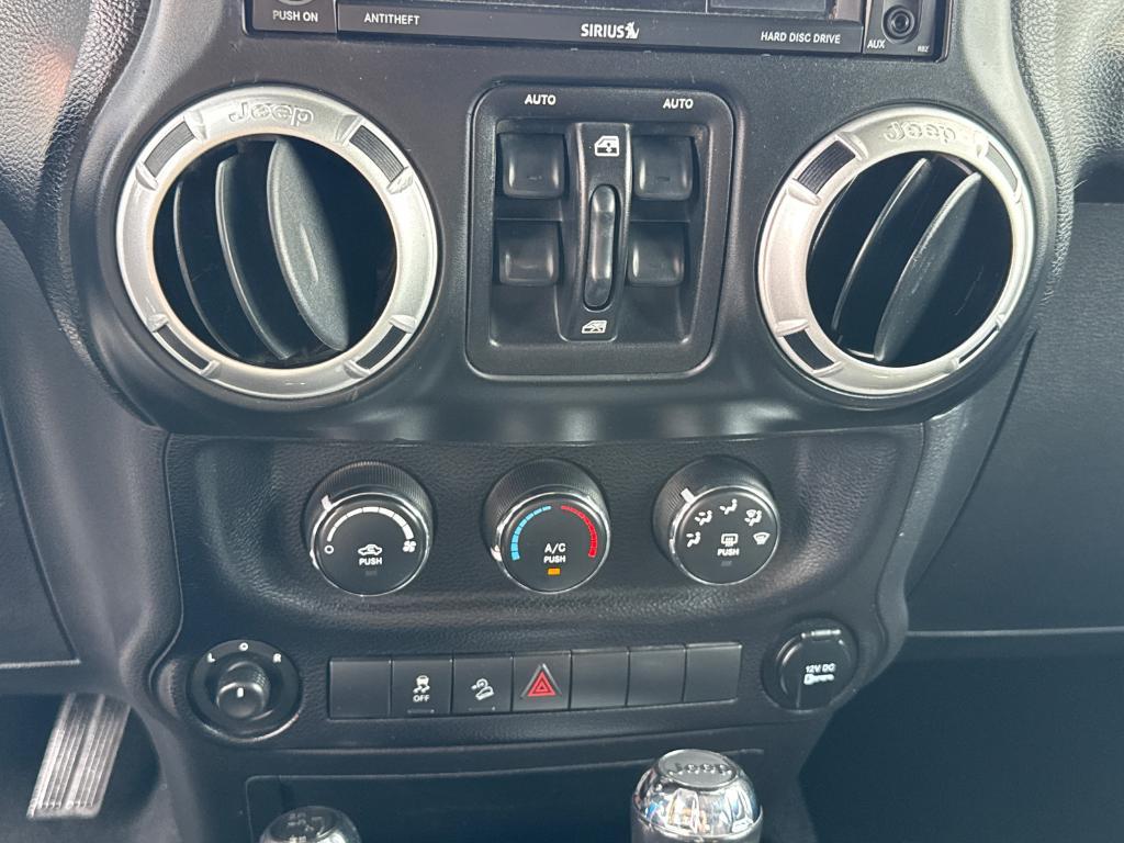 used 2014 Jeep Wrangler Unlimited car, priced at $13,988